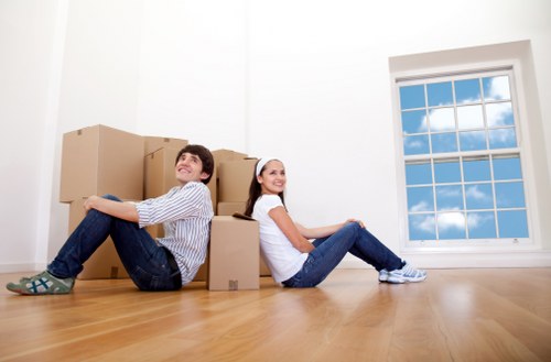 Professional movers handling furniture during a Locksbottom home move