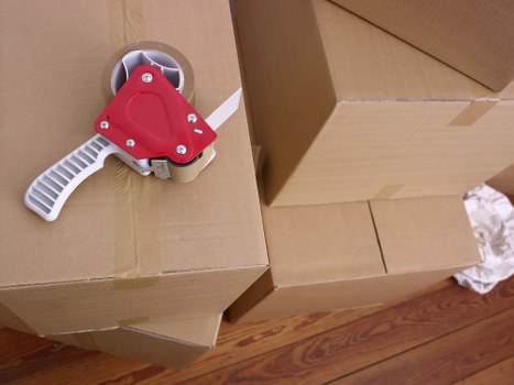 Careful packing of fragile items for house removals in Locksbottom
