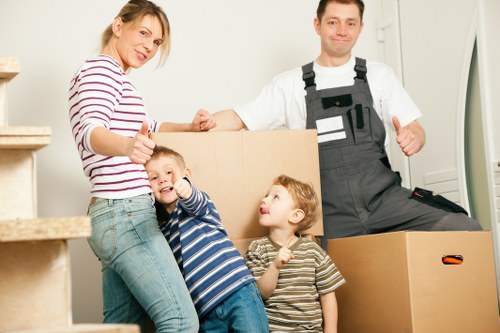 Loading furniture and boxes into a van for a move in Locksbottom